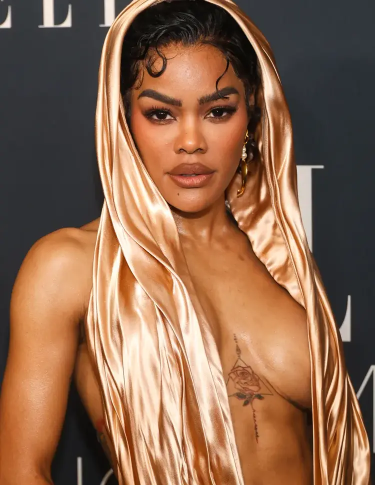 Teyana Taylor's Rose and Triangle tattoo 
