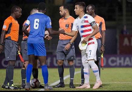 Coach Juan Pablo Torres in action during a professional soccer match, showcasing his expertise and experience as a former pro