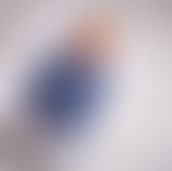 baby wrapped in blue cloth