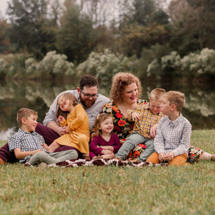 Couple commits to "love on" five adopted children