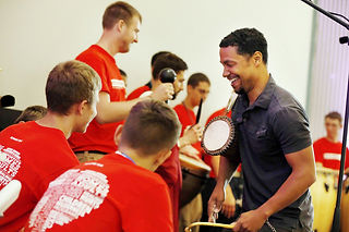 William Johnson, a musician from Pinehurst, leads boys from Cameron Boys Camp in a custom-arranged percussion piece that the group performed during the afternoon worship program at the church.