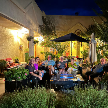 Night time guests with a relaxation vibes in the courtyard DreamCatcher Inn