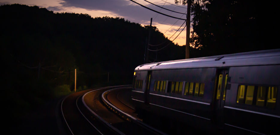 LIRR M3 electric train at Cold Spring Harbor during sunrise