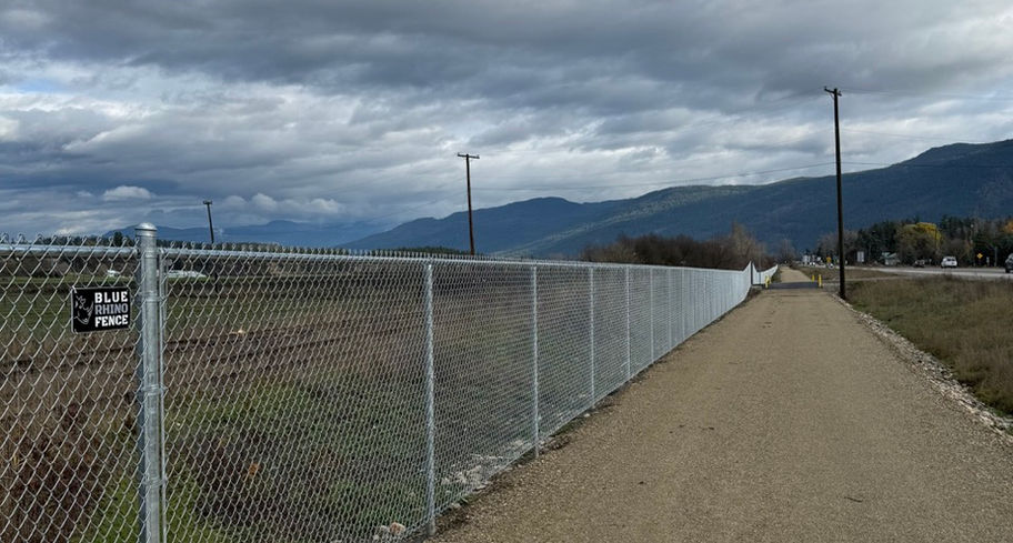 stormy skies over the new section of the armstrong rail trail