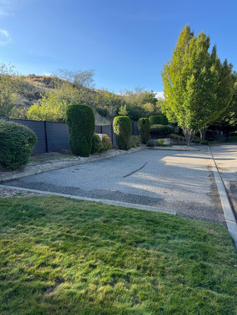 black and pewter metal privacy fence surrounding apartment complex near kelowna bc
