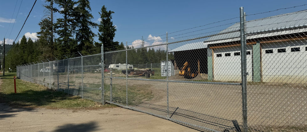 Chain link security fence with extra wire protection at the top that Blue Rhino Fence built for Enderby BC Public Works yard