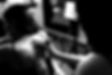 Rear view of a tattoo artist and a woman