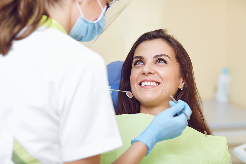 A woman and a dentist in a dental clinic_