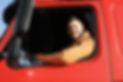 Male driver looking out of truck window