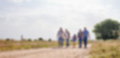 happy family walking holding hands