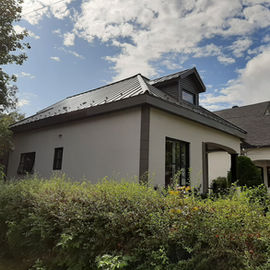 Maison moderne avec Toiture en métal 