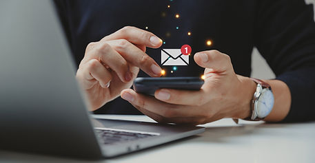 Hand of businessman using smartphone for email