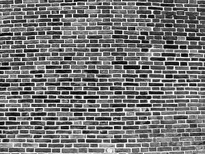 mur convexe en briques rouge foncé