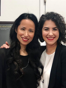 two woman in black clothes