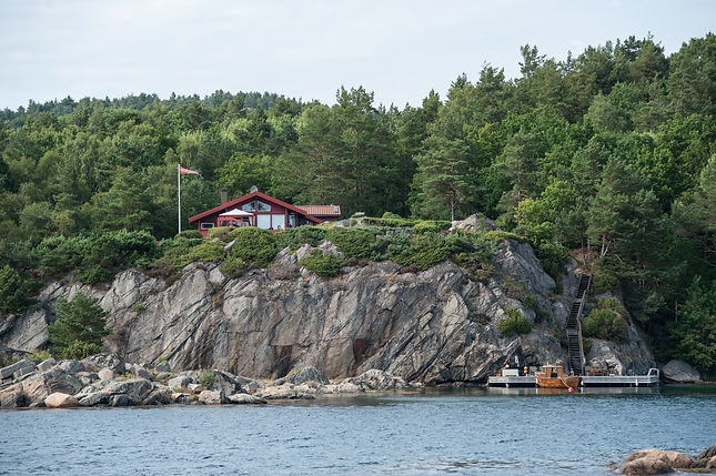 boat next to a cabin