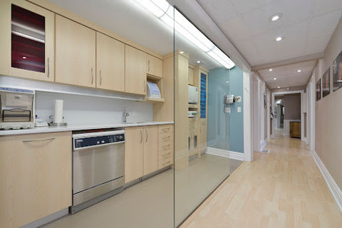 Modern kitchen and hallway with glass partition