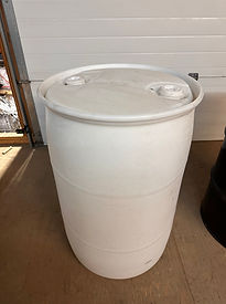White plastic storage barrel