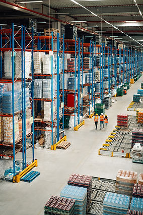 Warehouse workers walking and controlling goods and products on shelves