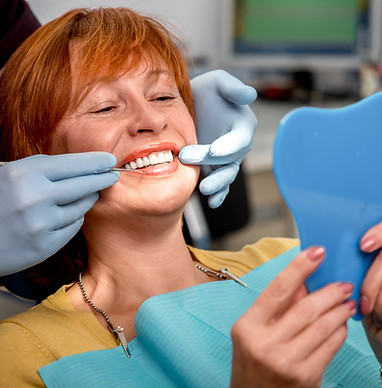 Senior woman in the dental office.