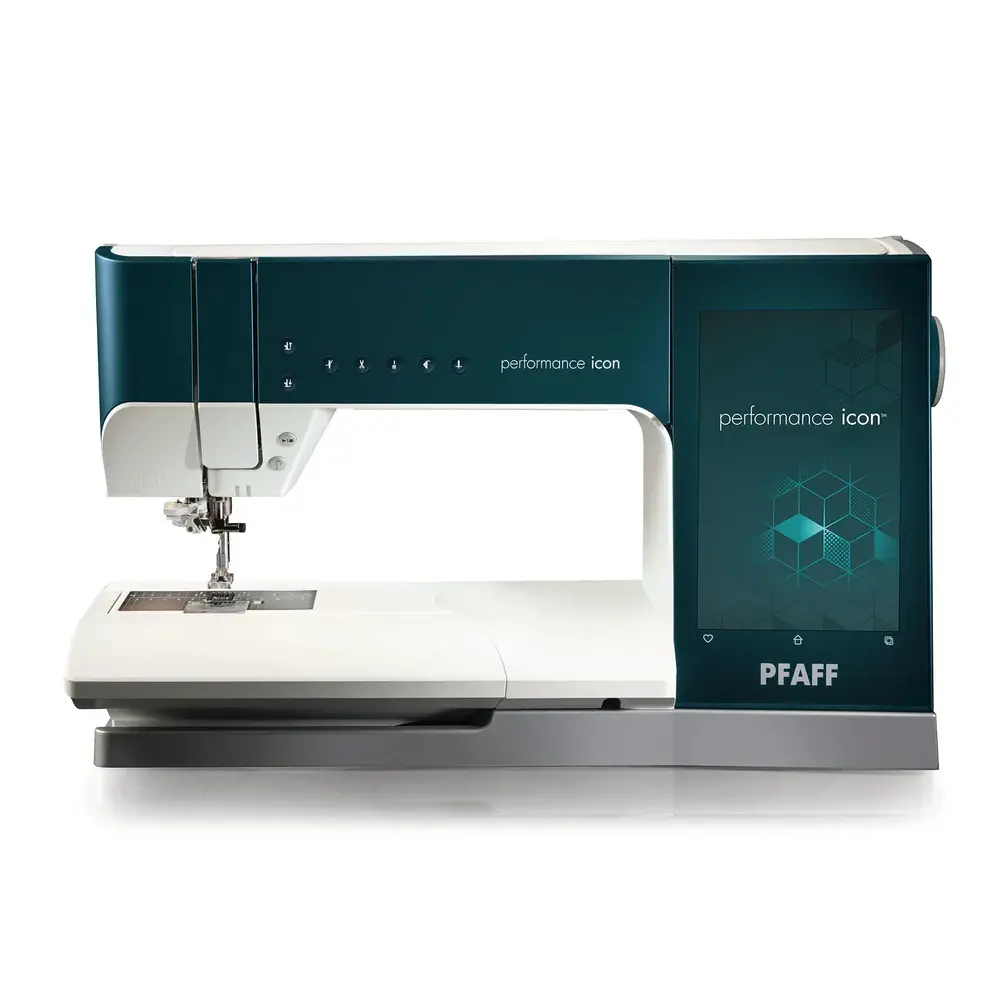 PFAFF teal and white sewing machine