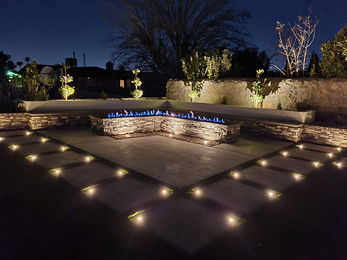 Outdoor Landscape Lighting and Fireplace with Seating Area - Enhance Your Outdoor Living Space | IJM Worx
