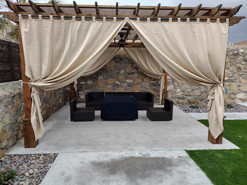Modern pergola in an urban setting with stylish design elements.