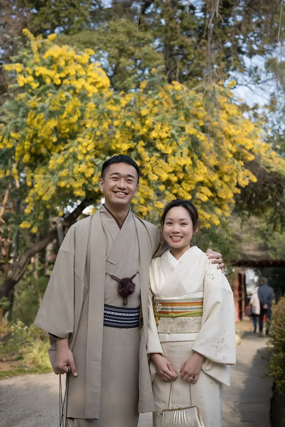 Two people wearing traditional Japanese kimonos walking in Kawagoe.