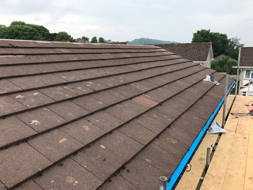 Newly installed brown roof tiles