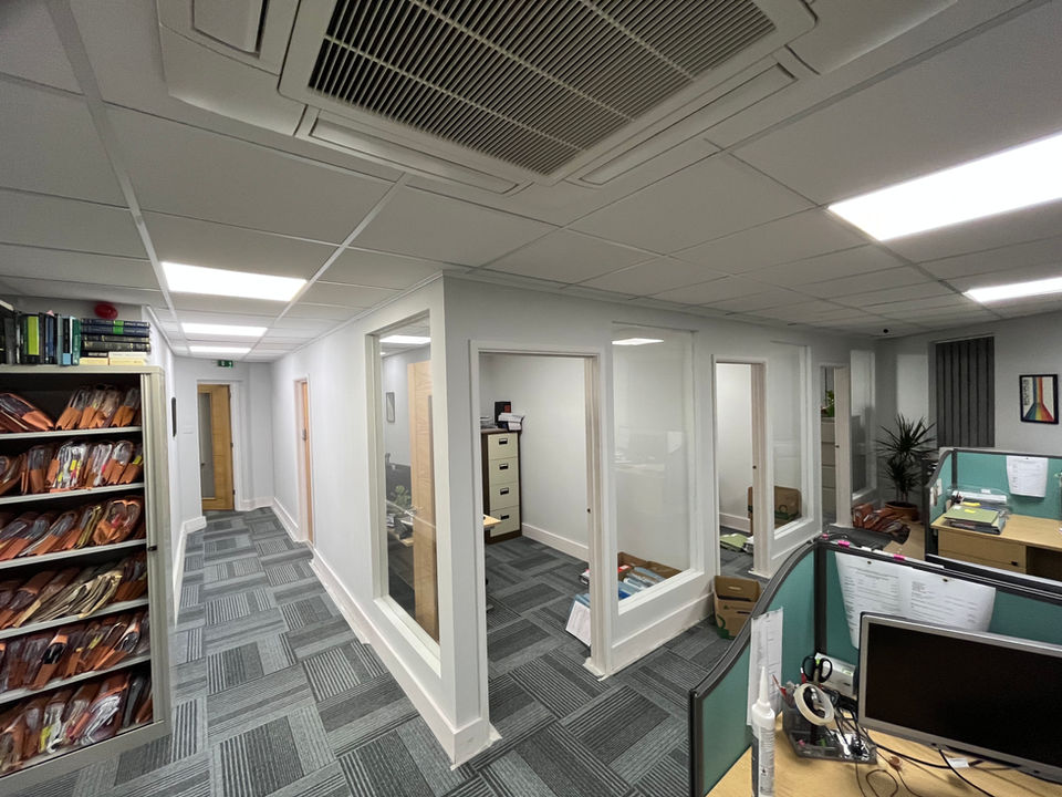 Modern office interior with glass partitions