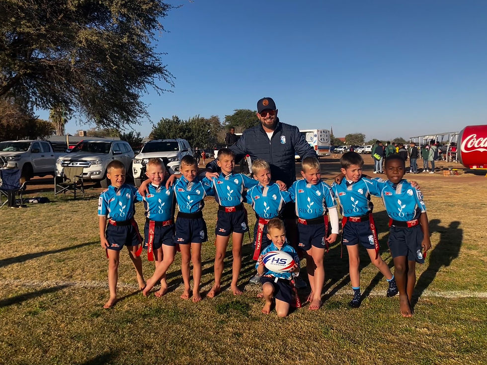 Coach Johan and the U/8 Ratels.