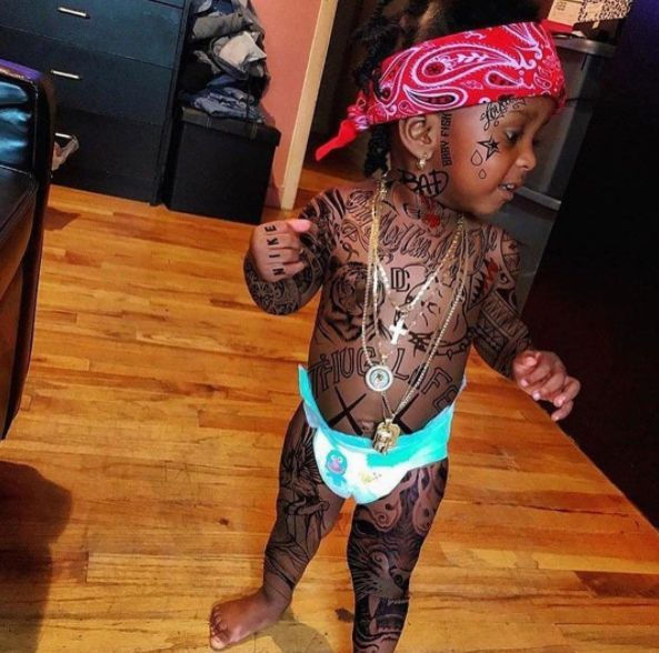 A young tattooed boy