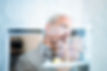 Businessman-drawing-graph-on-glass-wall-514369356_7952x5304.jpeg