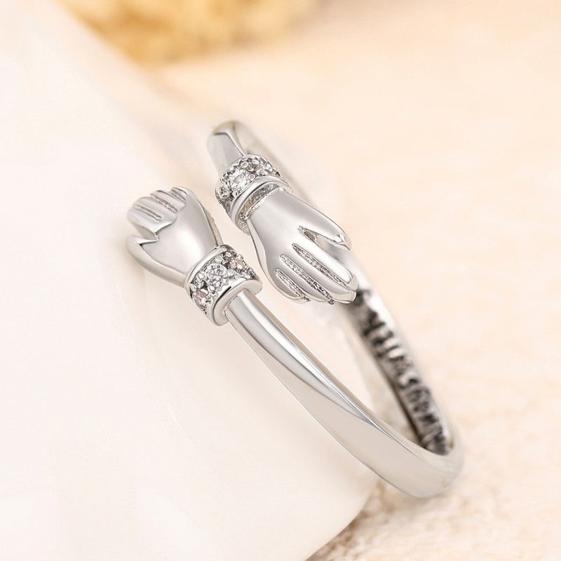 Miniatura: Anel Ajustável Huitan Abraço de Amor – Prateado e Dourado Delicado e Elegante!