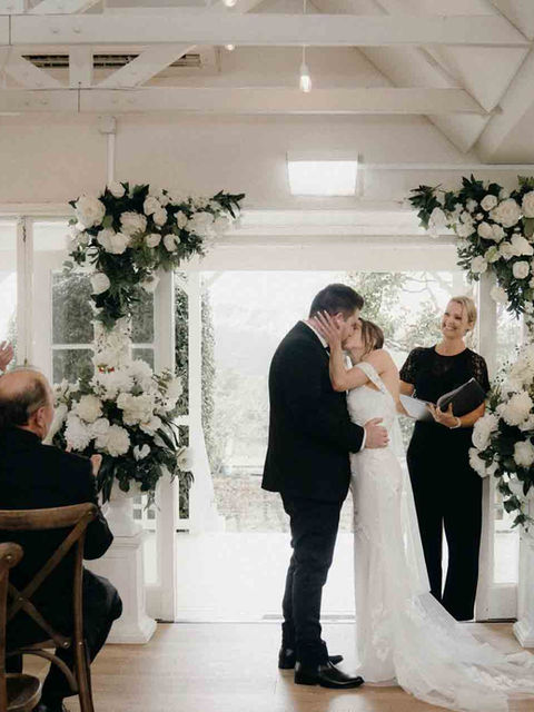 Vineyard wedding with lakeside backdrop at Abel Estate