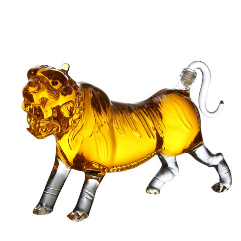A customized tiger-shaped glass bottle with intricate details and a curved tail stopper, designed for premium beverage packaging or decorative use.