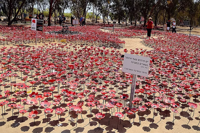 Nova Memorial field of ceramic red anemones Re'im forest.