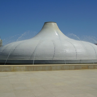 The white dome of the Shrine of the Book. The iconic architectural landmark of the Israel Museum designed to resemble the lids of the pottery jars that held the scrolls.