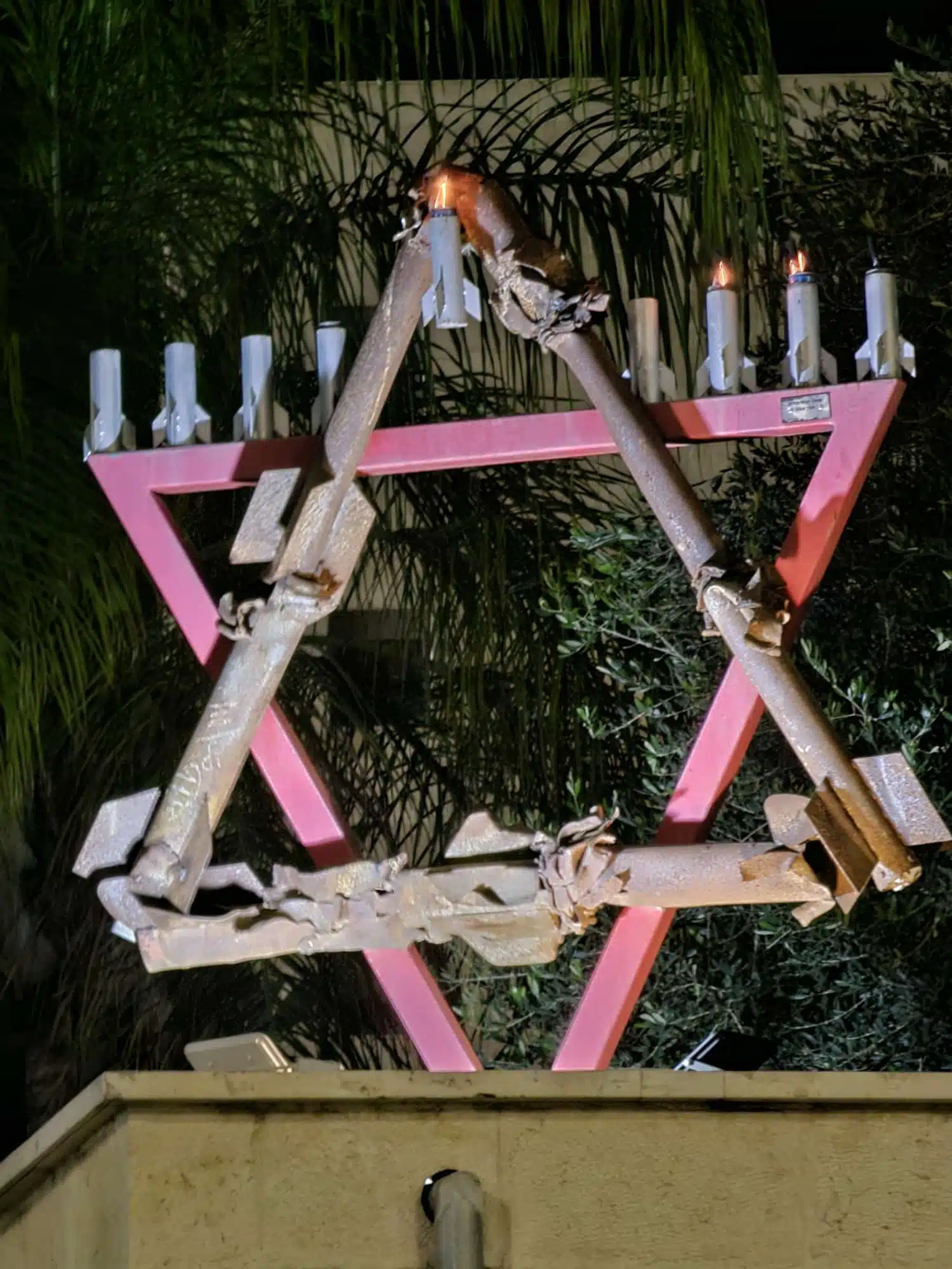 Sderot rocket menorah Hanukkah candelabra made from missile remnants.