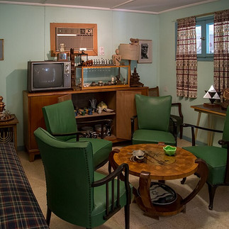 The living room of the Ben-Gurion house. A glimpse into the simple lifestyle of David and Paula Ben-Gurion, featuring mid-century furniture and personal artifacts.