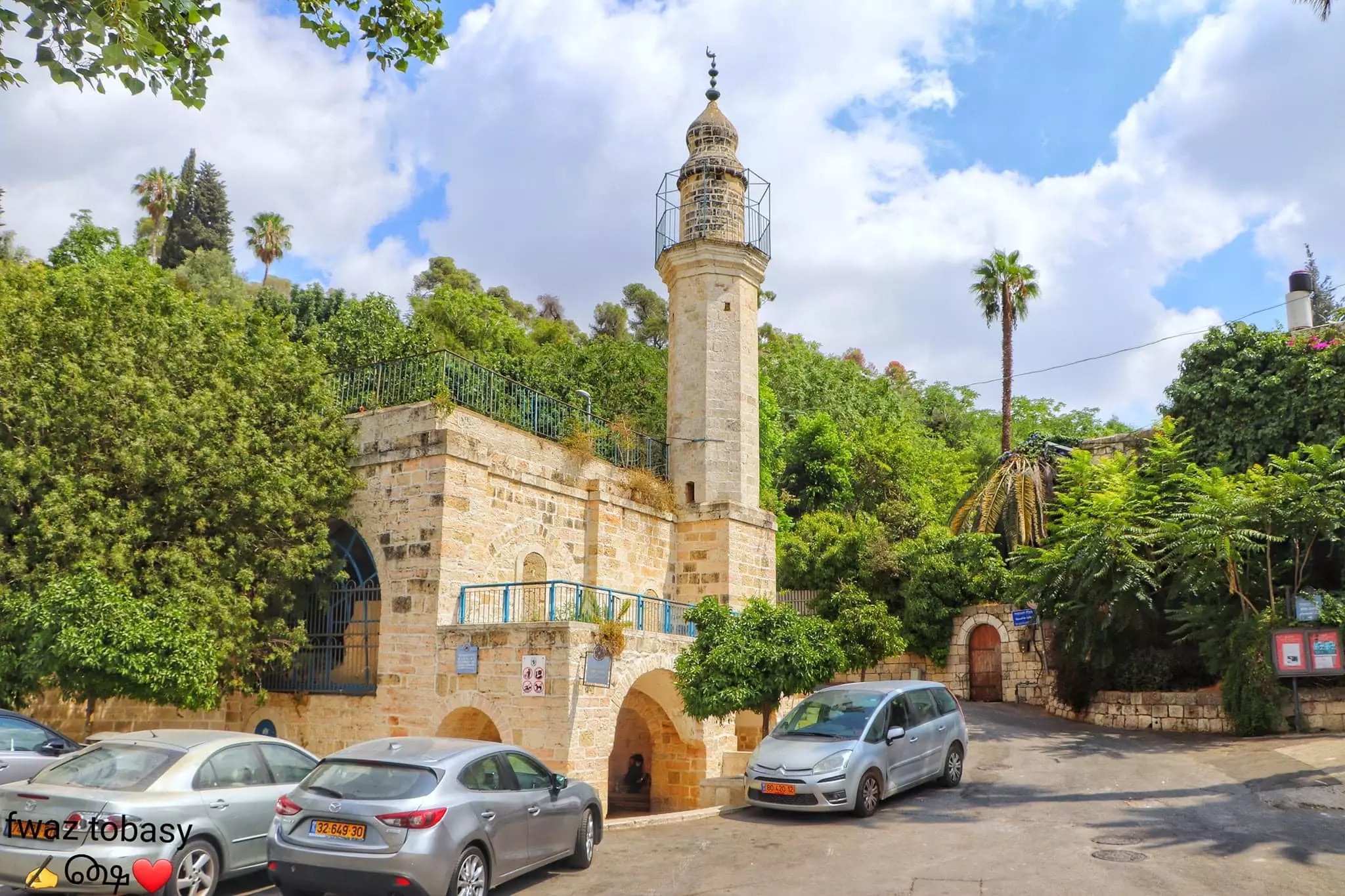 The historic site of Mary's Spring in Ein Kerem, featuring a traditional stone minaret and ancient masonry.