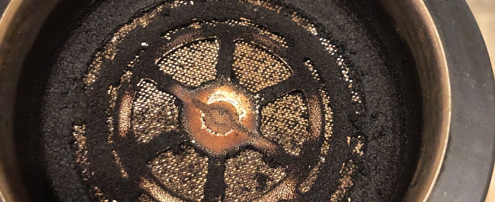 Dirty espresso machine shower screen