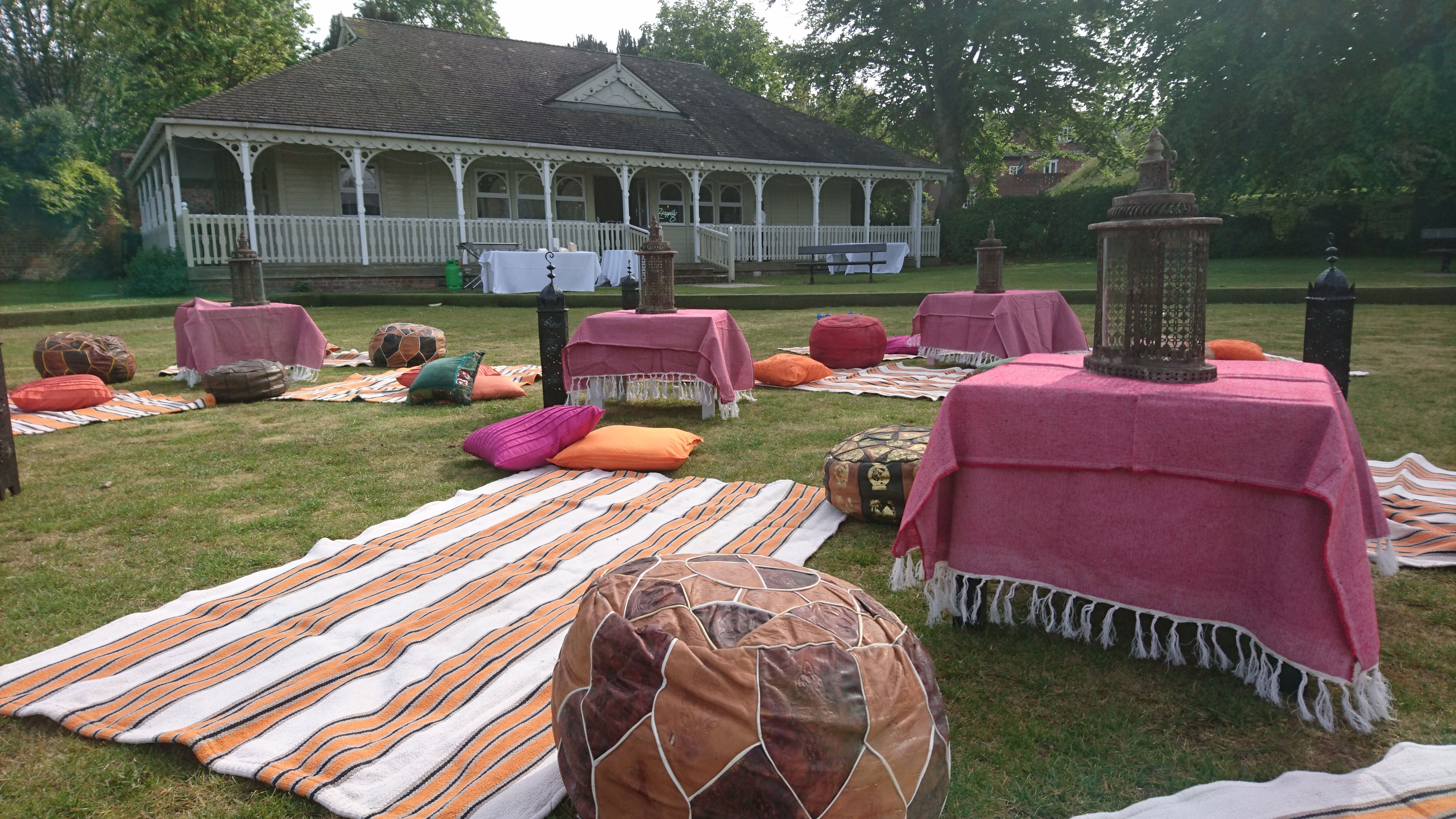 Moroccan pouffees throws and lanterns
