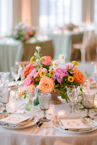 Colorful floral centerpiece on a wedding reception table