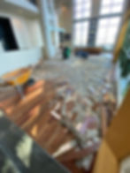 Before: We removed the entire wood floor, cleaned and prepped.