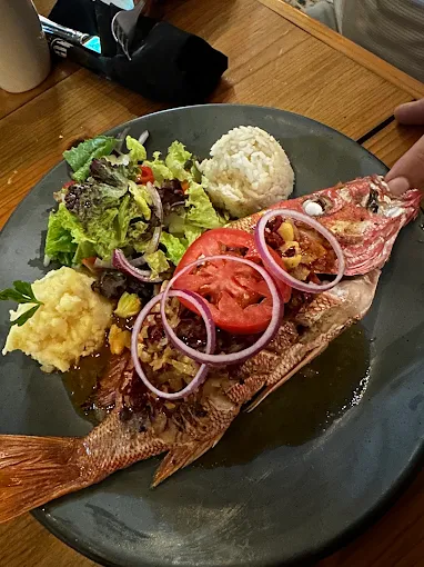 Whole fried fish dish at Los Morros, Aldea Zama
