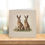 Thumbnail: Graceful Hares Duo Illustrated Greetings Card, on a shelf