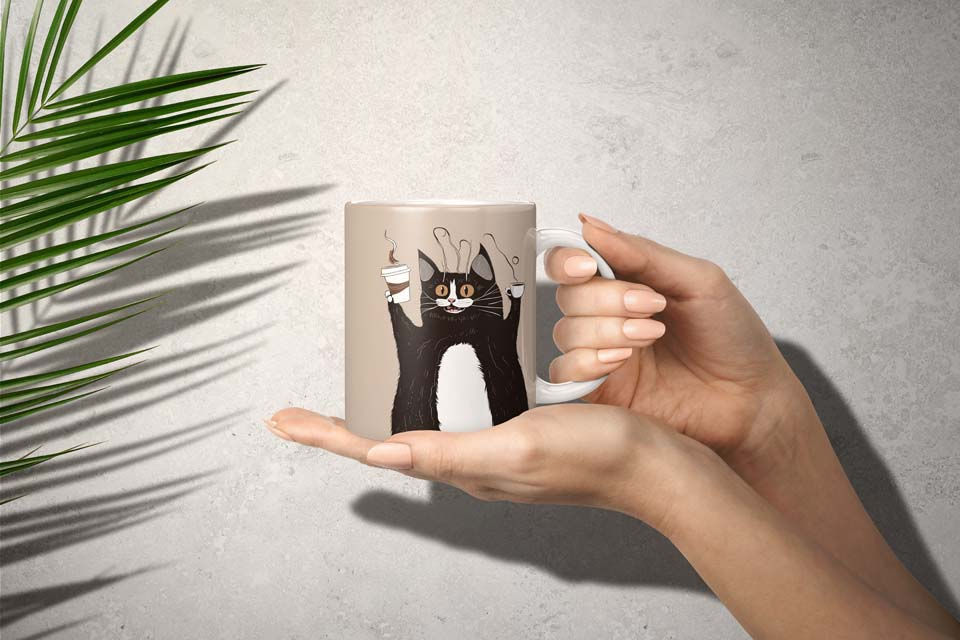 Beige Crazy Coffee Cat Ceramic Mug 11oz, fat cat drinking coffee, wired looking cat, beige background, black and white cat, coffee to go.