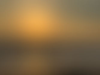 Sunset on the beach as waves come in
