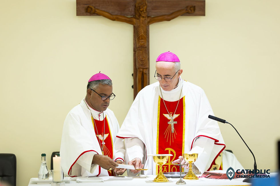 His Excellency Bishop Rozario Menezes, SMM, Bishop of the Diocese of Lae and the Vice President of CBCPNGSI, together with His Grace Archbishop Maurizio Bravi, prepares the altar before the Eucharistic Prayer.