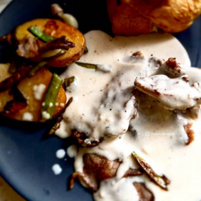 Beef steak with cheese sauce